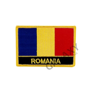 May include: A yellow, blue, and red embroidered patch with the word "ROMANIA" in black lettering.