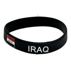 May include: Black silicone bracelet with the Iraqi flag and the word "IRAQ" printed in white.