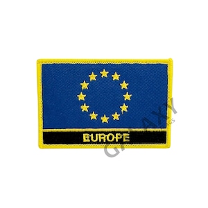 May include: A rectangular patch featuring the flag of Europe. The patch has a blue background with a circle of twelve yellow stars. The patch is bordered by a yellow frame and has the word "EUROPE" in yellow letters.