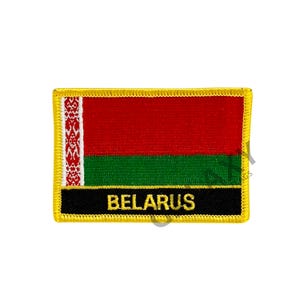 May include: A red and green embroidered patch with a white design and the word "BELARUS" in gold lettering. The patch has a yellow border.