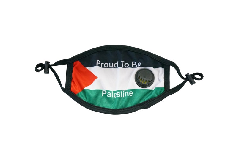 May include: Black face mask with a Palestinian flag design. The mask has a valve and adjustable ear loops. The text "Proud To Be Palestine" is printed on the mask.
