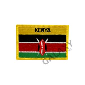 May include: An embroidered patch featuring the flag of Kenya. The patch is yellow with a black border and the word "KENYA" in black lettering. The Kenyan flag is red, black, and green with a white shield and two crossed spears in the centre.
