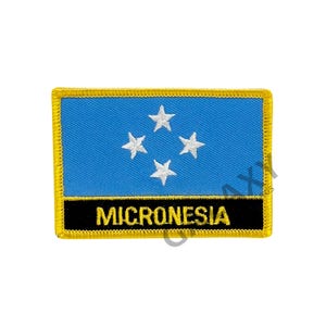 May include: A blue and white embroidered patch with four white stars and the word "MICRONESIA" in black lettering. The patch has a yellow border.