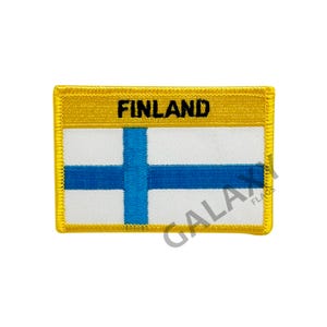 May include: A yellow embroidered patch with the word "FINLAND" in black text above a blue cross on a white background.