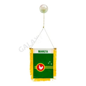 May include: A small green flag with a white chicken and three stars on a red circle. The flag has yellow fringe and says "MANU'A" at the top.
