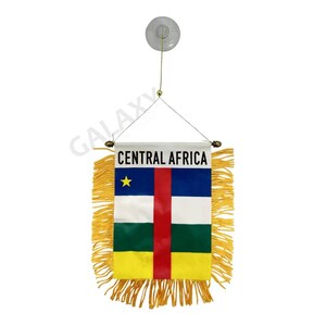 May include: A small, yellow fringed flag with the Central African Republic flag design. The flag has a yellow star, red, blue, white, and green stripes, and the text "CENTRAL AFRICA" printed on it.