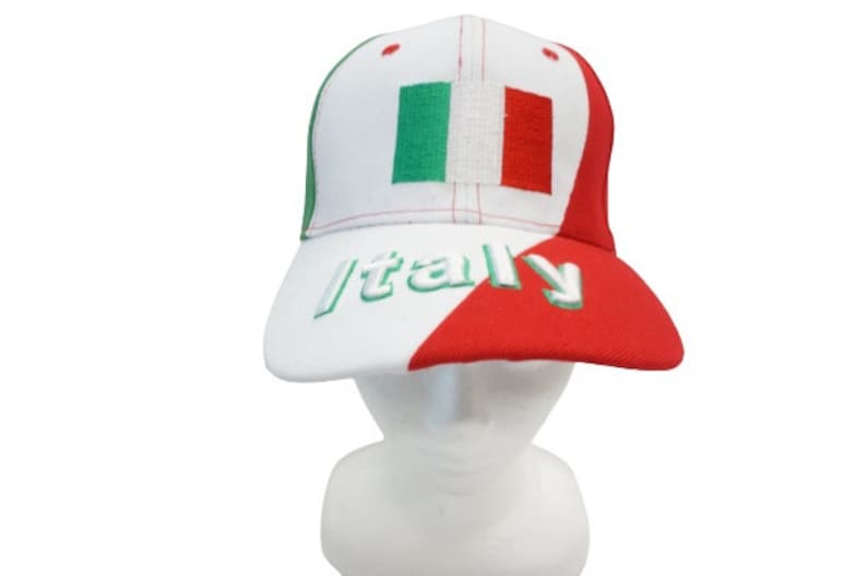 May include: A white and red baseball cap with the Italian flag on the front and the word "Italy" in green letters on the side.