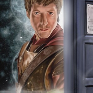 May include: Digital art print of a person in a red scarf and gold armor, partially obscured by a blue police box. The background features a starry, swirling galaxy design with bright light effects.
