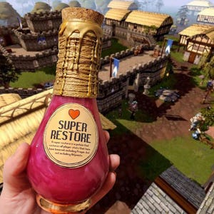 May include: A decorative potion bottle with a cork stopper and gold accents. The bottle is filled with a pink liquid and has a label that reads "SUPER RESTORE". The bottle is wrapped with twine and gold paint drips down the sides. The background shows a medieval village.