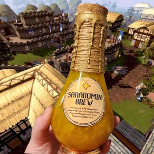 May include: A yellow glass bottle labeled "SARADOMIN BREW" with a cork stopper and gold accents. The bottle is wrapped with twine and has a label with text about the brew's effects. The background shows a medieval village.