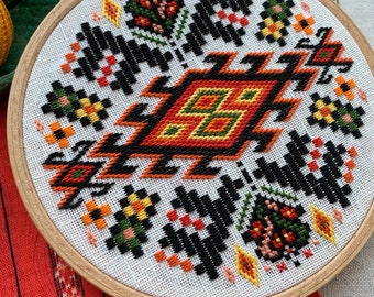 Ukrainian embroidery folk art, ethnic wall hanging, geometric embroidered hoop with floral motifs
