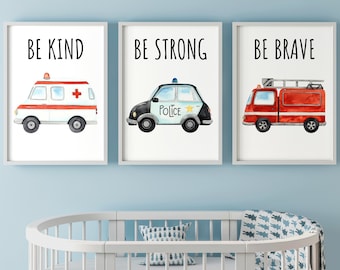 May include: Three white framed prints with watercolor illustrations of vehicles and the words "Be Kind", "Be Strong", and "Be Brave".