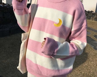 pink and white striped sweatshirt