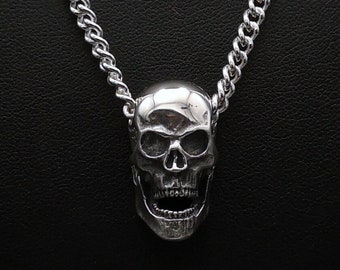 Large silver skull pendant necklace with silver curb chain