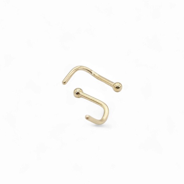 Clou de nez boule en titane pour piercings de 1 mm/18 g avec finition PVD or. Vendu à l'unité.