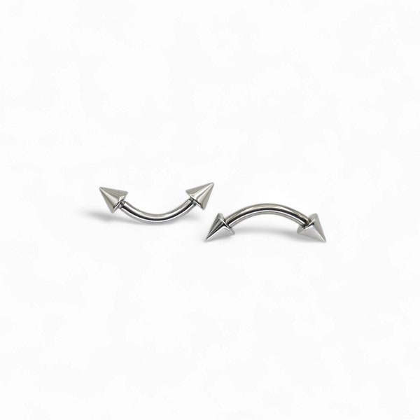 Surgical steel curved barbell 1.2mm/16g w/ spikes, 6 and 7mm length for eyebrow, rook and anti tragus piercings. Sold singly, not as a pair.