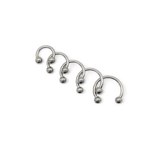 Titanium horseshoe barbell, 1.2mm/16g, externally threaded with 3mm balls, 6mm-9mm internal diameter. Sold singly, not as a pair.