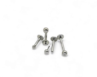 Titanium 1.2mm/16g threadless, push fit mini ball labret stud, 6mm-9mm length. Sold singly, not as a pair.