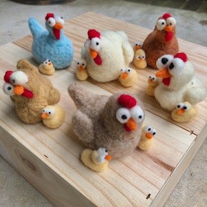 Back in stock! Felted Chickens and chicks! These chickens have their hands full with their chicks by their side. Colors vary, customizable.