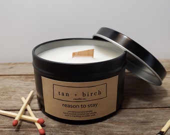 Reason to Stay. 7oz hand-poured sandalwood and smoke scented coconut soy candle with a wooden wick that crackles