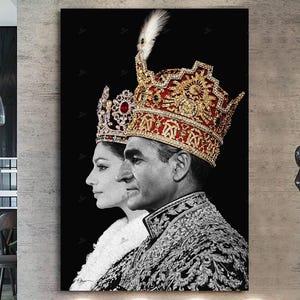 May include: Black and white portrait of a man and woman in profile, wearing ornate crowns and embellished clothing. The artwork is displayed on a wall in a modern interior setting, with a sculpture in the foreground.