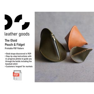 May include: Three oloid-shaped leather pouches in olive green and tan. One olive pouch features a central silver zip, another olive pouch has a decorative baseball stitch, and a tan pouch is plain. Text reads: leather goods The Oloid Pouch & Fidget.