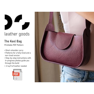 May include: A deep burgundy leather shoulder bag with a curved base and a flap closure. The text reads: leather goods, The Keel Bag, Printable PDF Pattern, Short-shoulder carry, Patterns for a fully lined and a non-lined version, Step-by-step instructions, ~2 sq ft of leather needed.