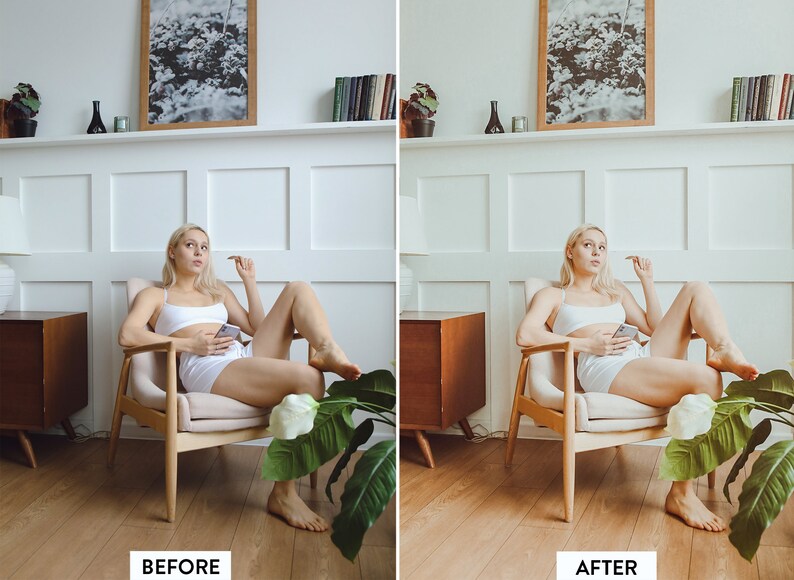 May include: A woman sits in a light-colored armchair in a white room. She is wearing a white tank top and white shorts. She is holding a phone in her hand and looking to the side. There is a plant in the foreground and a wooden side table in the background.