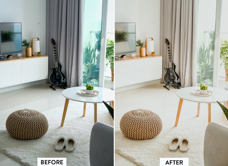 May include: A white living room with a white coffee table, a brown ottoman, and a guitar leaning against a wall. The room has a large window with a view of greenery.