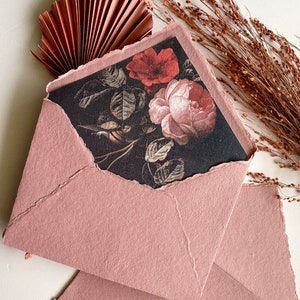 Dusty blush pink handmade cotton envelope with a fine art floral envelope liner. For wedding invitations, gifts and special occasions.