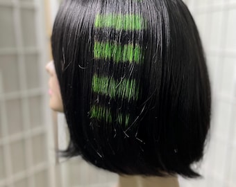 Extensión de cabello de cola de mapache negra y verde