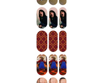May include: Set of 10 nail decals featuring images from classic horror films. The decals feature images of twins from "The Shining", Jack Nicholson from "The Shining", the twins from "The Shining", the carpet from "The Shining", and Danny from "The Shining".