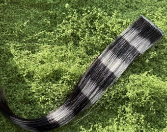 Extensiones de pelo de cola de mapache negras y grises