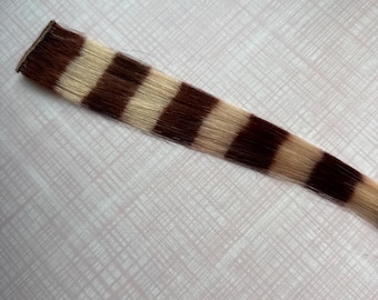 Extensiones de cabello de cola de mapache rubias y castañas