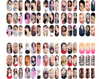 May include: A sheet of nail stickers featuring images of a K-pop girl group. The stickers are arranged in a grid pattern and feature various images of the group members. The stickers are designed to be applied to fingernails.