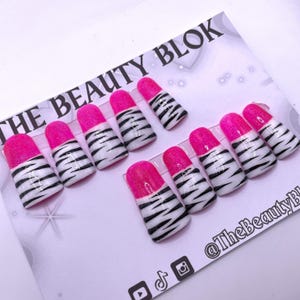 Pink glitter and zebra press on nail set