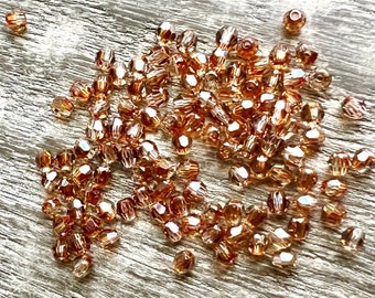 Swarovski 3mm Round Crystals (crystal copper, vintage rose, golden shadow) * 3mm vintage rose Swarovski, crystal copper 3mm round Swarovski