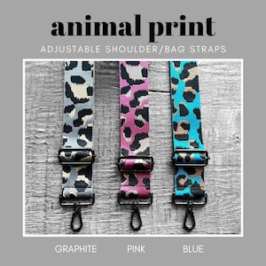 May include: Three adjustable shoulder or bag straps with an animal print design. The straps are shown in graphite, pink, and blue.