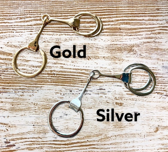 Discover silver or gold scarf buckles here