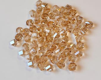 Swarovski Helix Bead (article 5020): 8mm Golden Shadow, Swarovski Golden Shadow Crystals, 8mm Swarovski Helix Bead