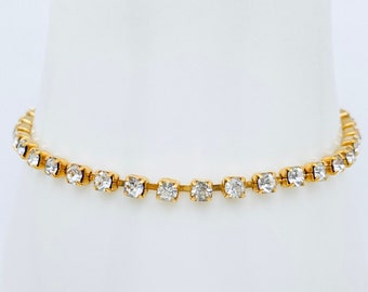 SARAH COVENTRY Rhinestone Tennis Bracelet - 7 inch Golden Rhinestone bracelet