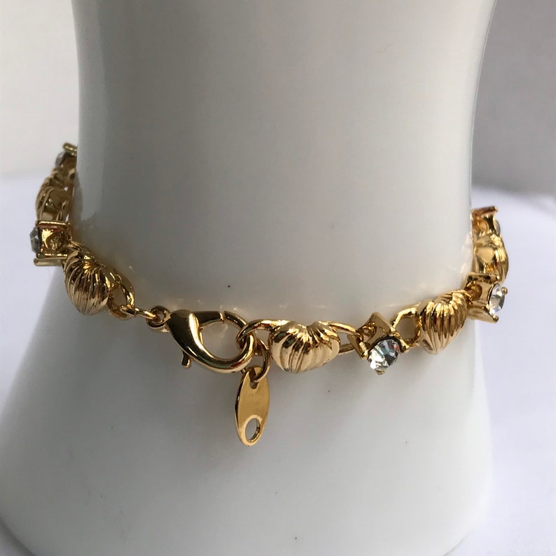 vintage small gold tone 1997 AVON Heart Bracelet and Earring Gift Set clear rhinestone