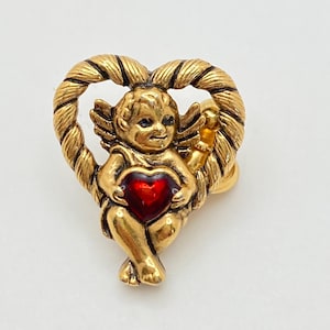 May include: A set of three ceramic mugs with a speckled, matte finish. The mugs are in shades of cream, light gray, and dark gray. Each mug has a simple, minimalist design, perfect for coffee or tea.