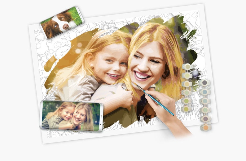 May include: A paint-by-numbers kit featuring a portrait of a woman and a child, with a smartphone displaying the same image. A second smartphone shows a dog. Paint colors and a paintbrush are also visible.