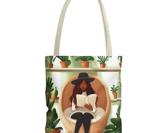 May include: A tote bag with a colorful illustration of a woman sitting in a wicker chair, reading a book. The background features a shelf with potted plants.