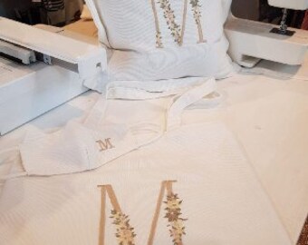 Mascherine, shooper e cuscini personalizzati con iniziali e altri simboli