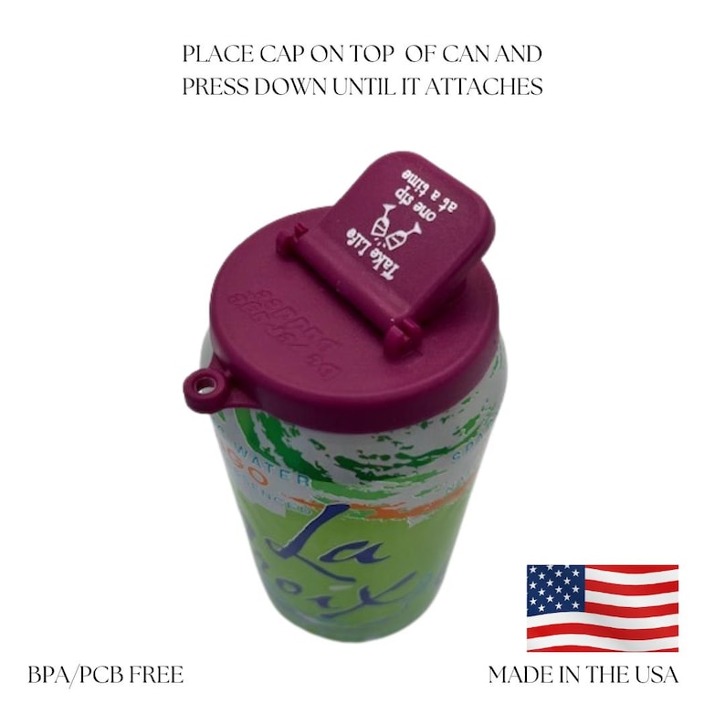 Puede incluir: Una tapa de lata reutilizable de color morado con las palabras "Take Life one sip at a time" impresas en ella. La tapa est&aacute; unida a una lata verde y blanca con la palabra "La Croix" impresa en ella. La tapa est&aacute; libre de BPA/PCB y est&aacute; hecha en los Estados Unidos.