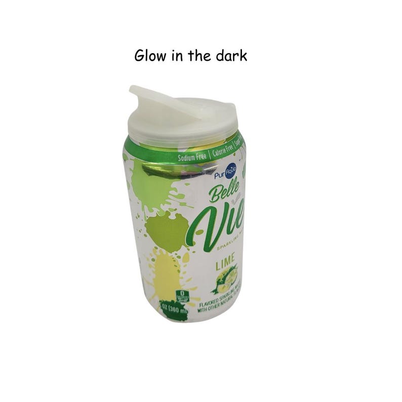 May include: A silver can of Belle Vie sparkling lime flavored water with a white glow-in-the-dark lid. The can is 12 oz (355 ml) and is sodium and calorie free.