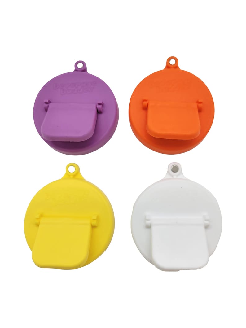 May include: Four round, colorful, plastic bottle stoppers with a flip-top lid. The stoppers are purple, orange, yellow, and white.