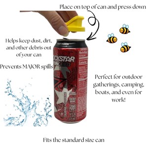 May include: Yellow plastic can lid cover with a red and black energy drink can. The lid cover is placed on top of the can. The text on the can reads "Rockstar Punched".